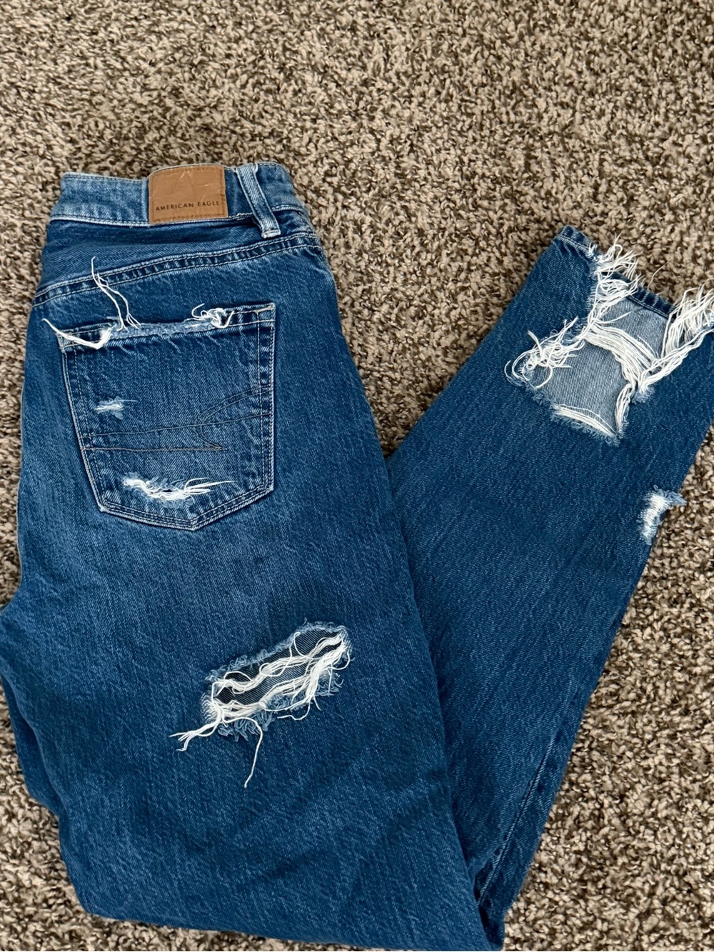 American Eagle Outfitters women’s Dark Blue Distressed Relaxed Jeans